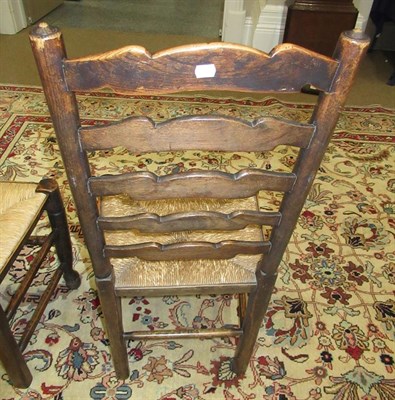 Lot 165 - A Set of Six Mid 19th Century Ash and Rush-Seated Ladderback Chairs, including two carvers, the...