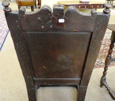 Lot 167 - A 17th Century Joined Oak Wainscot Armchair, the top rail above a geometric carved border with...