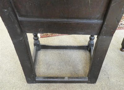 Lot 167 - A 17th Century Joined Oak Wainscot Armchair, the top rail above a geometric carved border with...