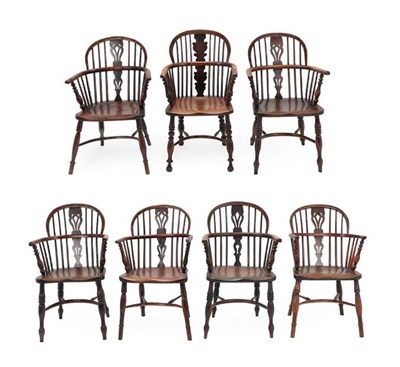Lot 168 - A Harlequin Set of Seven Windsor Armchairs, comprising three matched yewwood examples with...