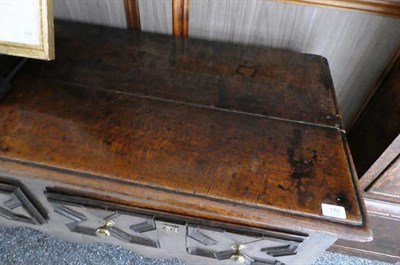 Lot 172 - An Oak Dresser Base, basically late 17th century, the moulded top above three geometric moulded...