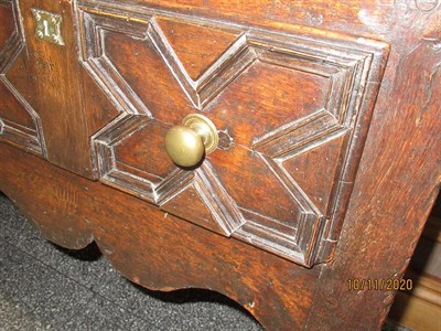 Lot 172 - An Oak Dresser Base, basically late 17th century, the moulded top above three geometric moulded...