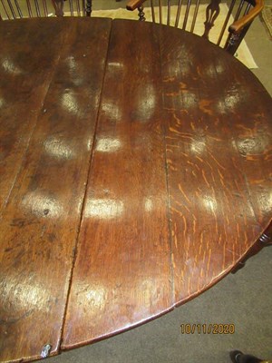 Lot 176 - A Late 17th Century Six-Seater Oak Gateleg Dining Table, with two rounded dropleaves (retipped)...