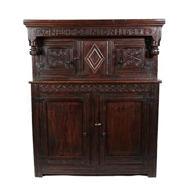 Lot 182 - A 17th Century Joined Oak Press Cupboard, named Agnes Robinson 1689, the canopy top above...