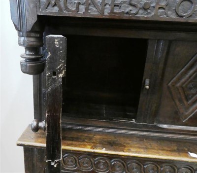 Lot 182 - A 17th Century Joined Oak Press Cupboard, named Agnes Robinson 1689, the canopy top above...
