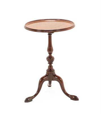 Lot 196 - A George III Mahogany Tripod Table, late 18th century, the circular dished top above a vasiform and