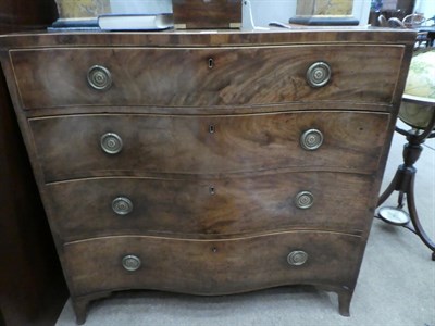 Lot 199 - A George III Mahogany Serpentine Chest of Drawers, late 18th century, the four deep drawers...