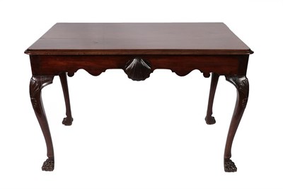 Lot 212 - A George III Irish Carved Mahogany Serving Table, late 18th century, the moulded top above a shaped