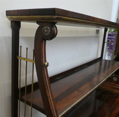 Lot 220 - A Regency Rosewood and Gilt Metal Mounted Bookcase, early 19th century, the upper section with...