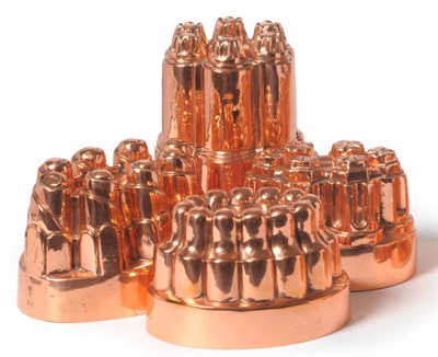 Lot 1073 - A Group of Four Highly Decorative Copper Jelly Moulds, Benham & Froud, London, late 19th...