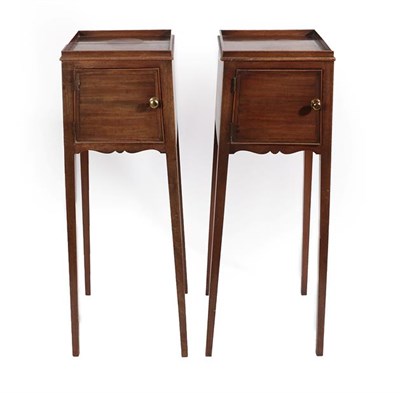 Lot 230 - A Pair of George III Mahogany Tray-Top Bedside Cupboards, early 19th century, with boxwood and...