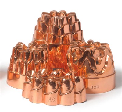 Lot 1075 - A Group of  Four Copper Jelly Moulds, English and French, late 19th century, comprising a crown...