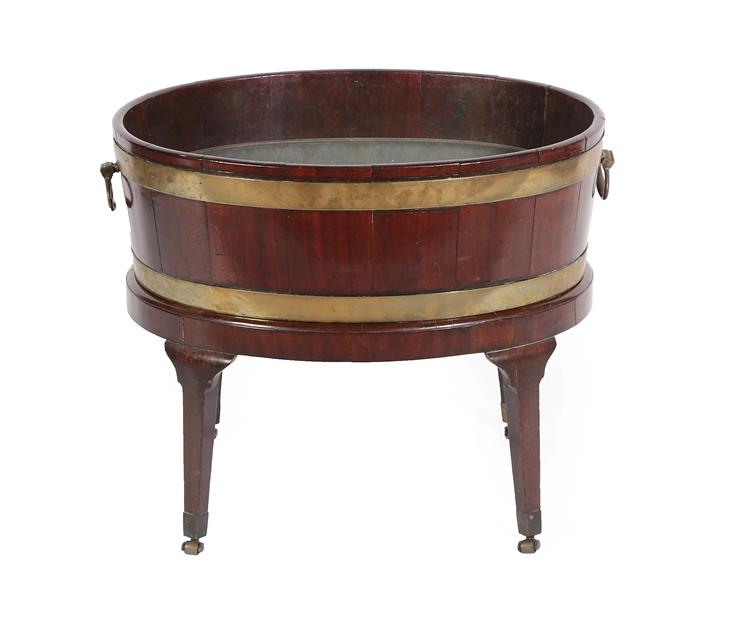 Lot 244 - A George III Mahogany and Brass Bound Oval Wine Cooler, stamped Gillows, late 18th century, of...