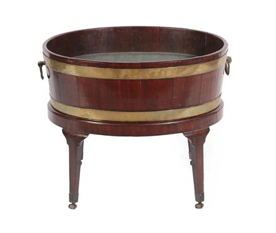 Lot 244 - A George III Mahogany and Brass Bound Oval Wine Cooler, stamped Gillows, late 18th century, of...