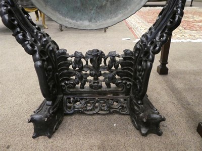 Lot 245 - A Chinese Carved Hardwood Dinner Gong, late 19th/early 20th century, the foliate carved frame...