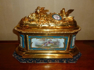 Lot 1076 - A French Ormolu and Sèvres Style Porcelain Panel Mounted Table Casket, circa 1870, of round...