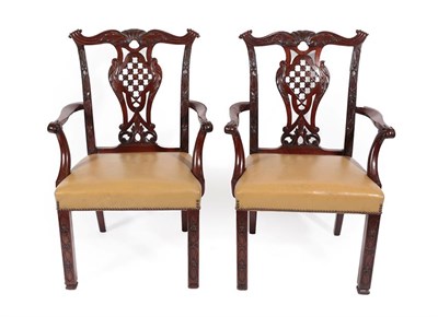 Lot 265 - A Pair of Chippendale Revival Carved Mahogany Carver Chairs, late 19th century, covered in...