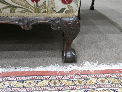 Lot 270 - A Carved Mahogany Two-Seater Sofa, late 19th/early 20th century, recovered in modern crewelwork...