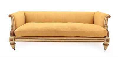 Lot 273 - A Cream and Parcel Gilt Sofa, in the manner of William Kent, covered in yellow fabric, with...