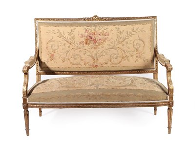 Lot 279 - A Late 19th Century French Carved Giltwood Two-Seater Canapé, upholstered in floral...