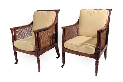 Lot 281 - A Pair of Regency Mahogany Uxbridge Library Reading Chairs, early 19th century, possibly by...