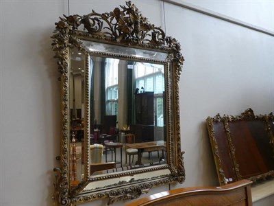 Lot 290 - A French Gilt and Gesso Marginal Wall Mirror, 3rd quarter 19th century, the bevelled glass...