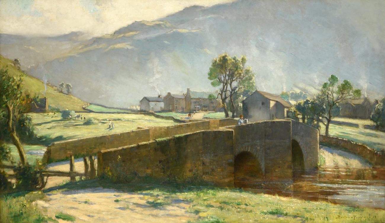 Lot 1052 - Bertram Priestman RA ROI NEAC IS (1868-1951) A view of Buckden Bridge with haymaking beyond...