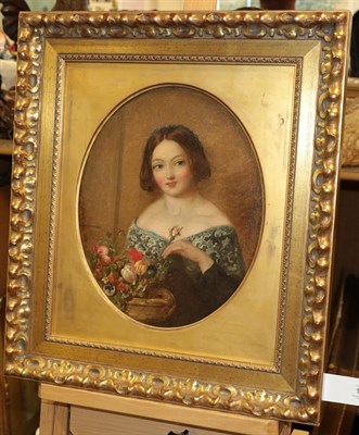 Lot 1116 - Circle of William Powell Frith RA (1819-1909) Portrait of a young lady arranging flowers Bears...