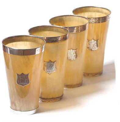 Lot 1096 - A Set of Four Victorian Silver Mounted Cow Horn Beakers, London 1877, retailed by L West, St...