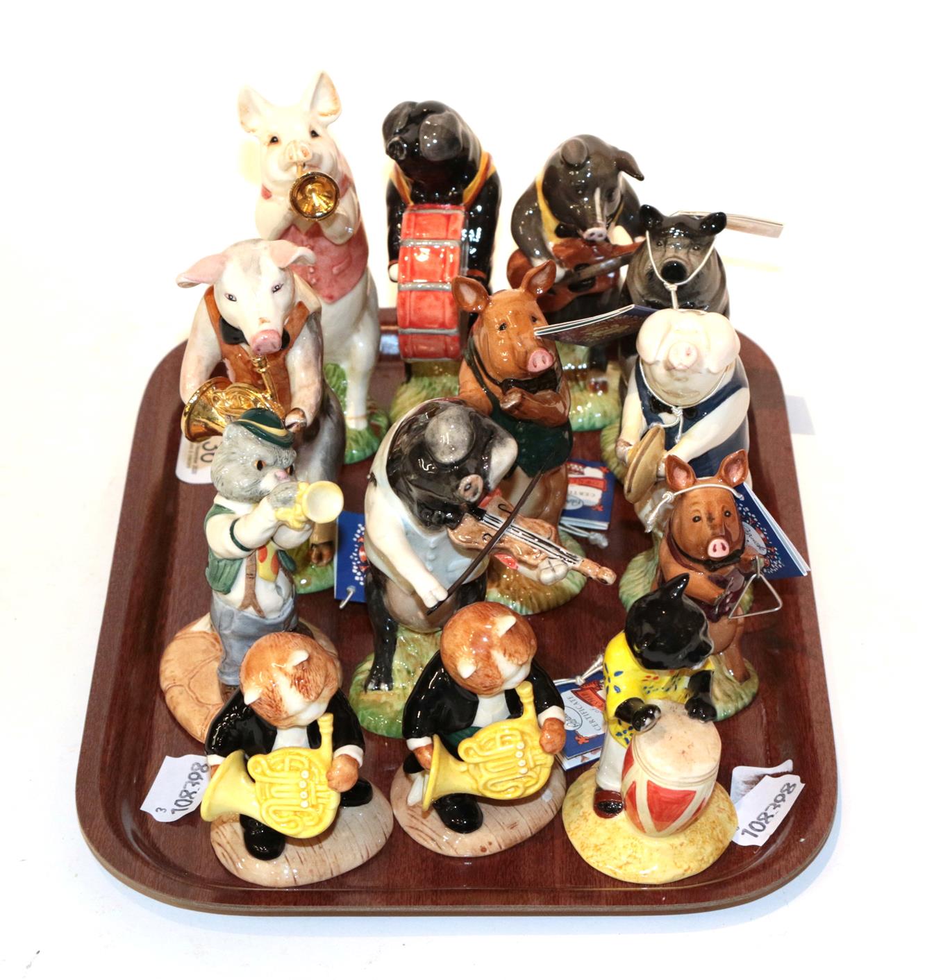 Lot 36 - A group Beswick pig and cat band models (13)