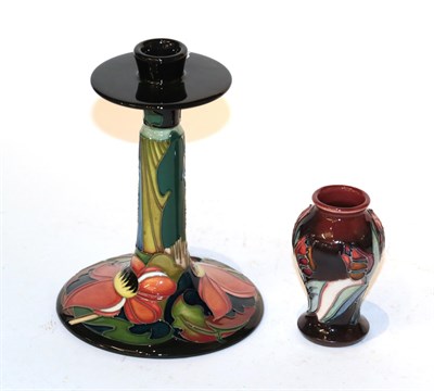 Lot 42 - A Moorcroft Mackintosh style candlestick with a miniature vase (2)