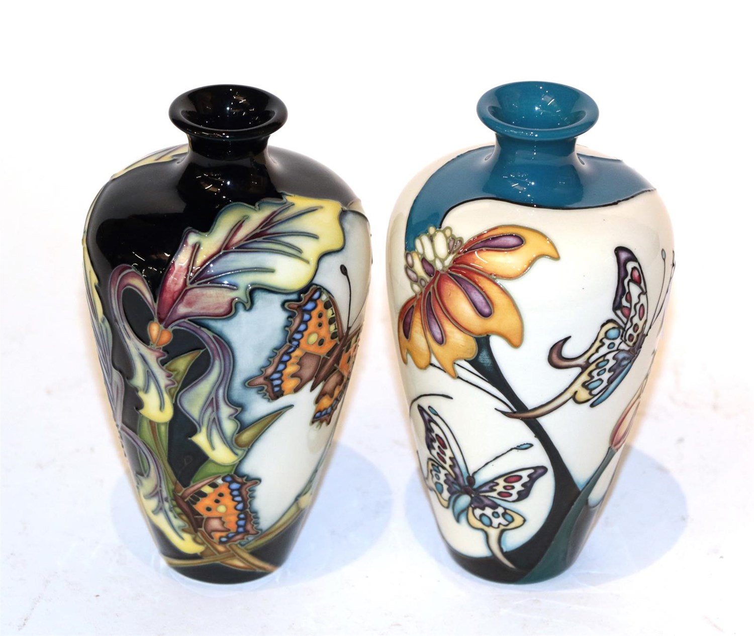 Lot 47 - Two Moorcroft butterfly vases (2)