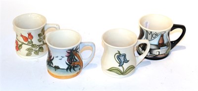 Lot 48 - Four Moorcroft mugs (4)