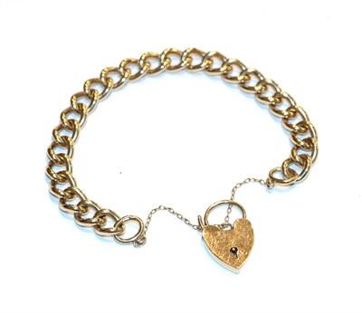 Lot 65 - A curb link bracelet, stamped '9' and '.375', with a 9 carat gold heart shaped padlock clasp,...