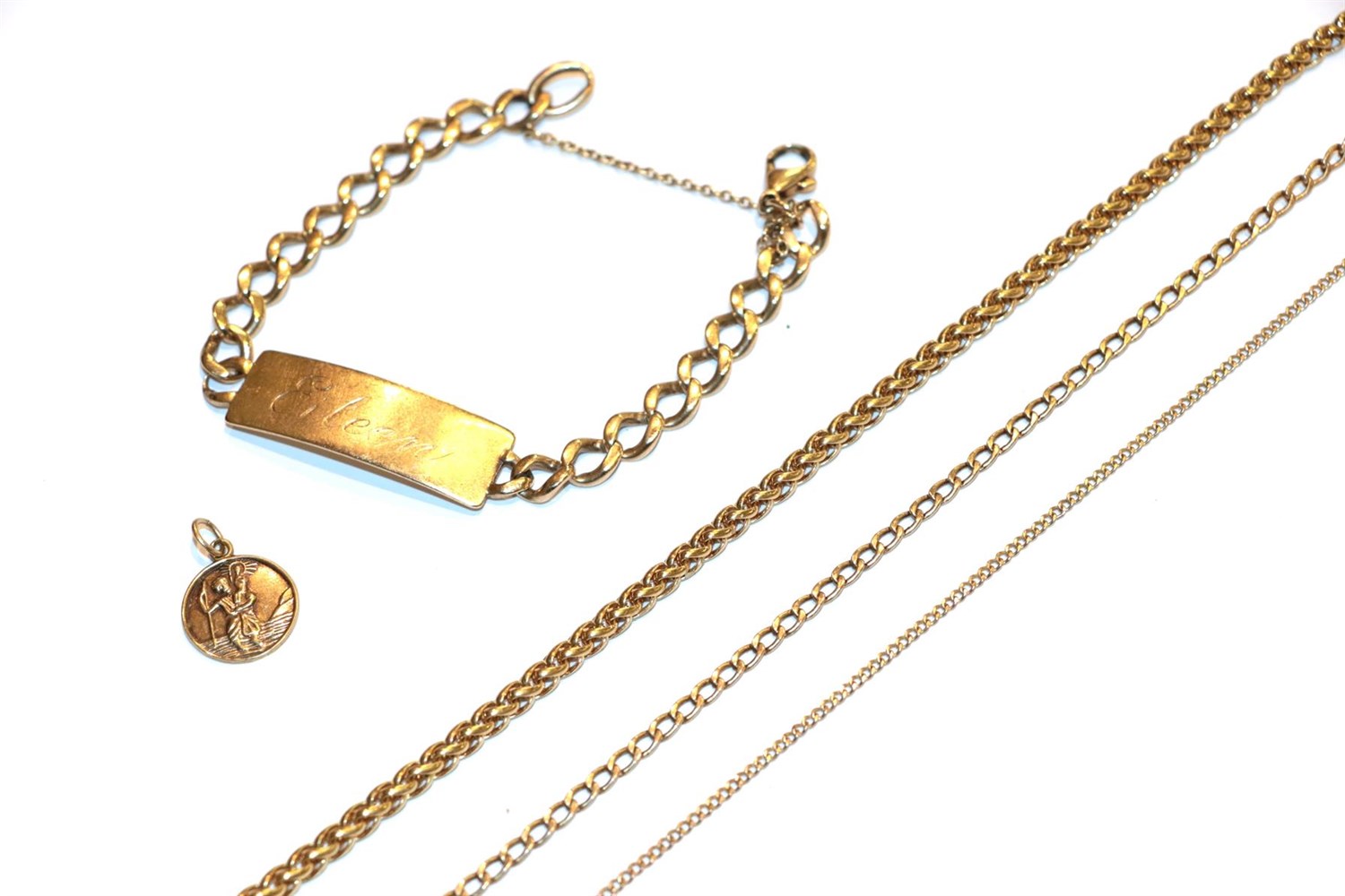 Lot 68 - A 9 carat gold identity bracelet, length 20cm, a 9 carat gold St Christopher pendant, a curb...