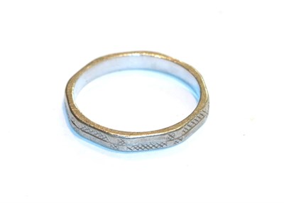 Lot 73 - A band ring, stamped 'PLATINUM', finger size M1/2