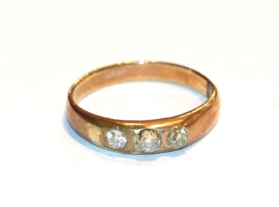 Lot 75 - A diamond three stone ring, unmarked, finger size L1/2