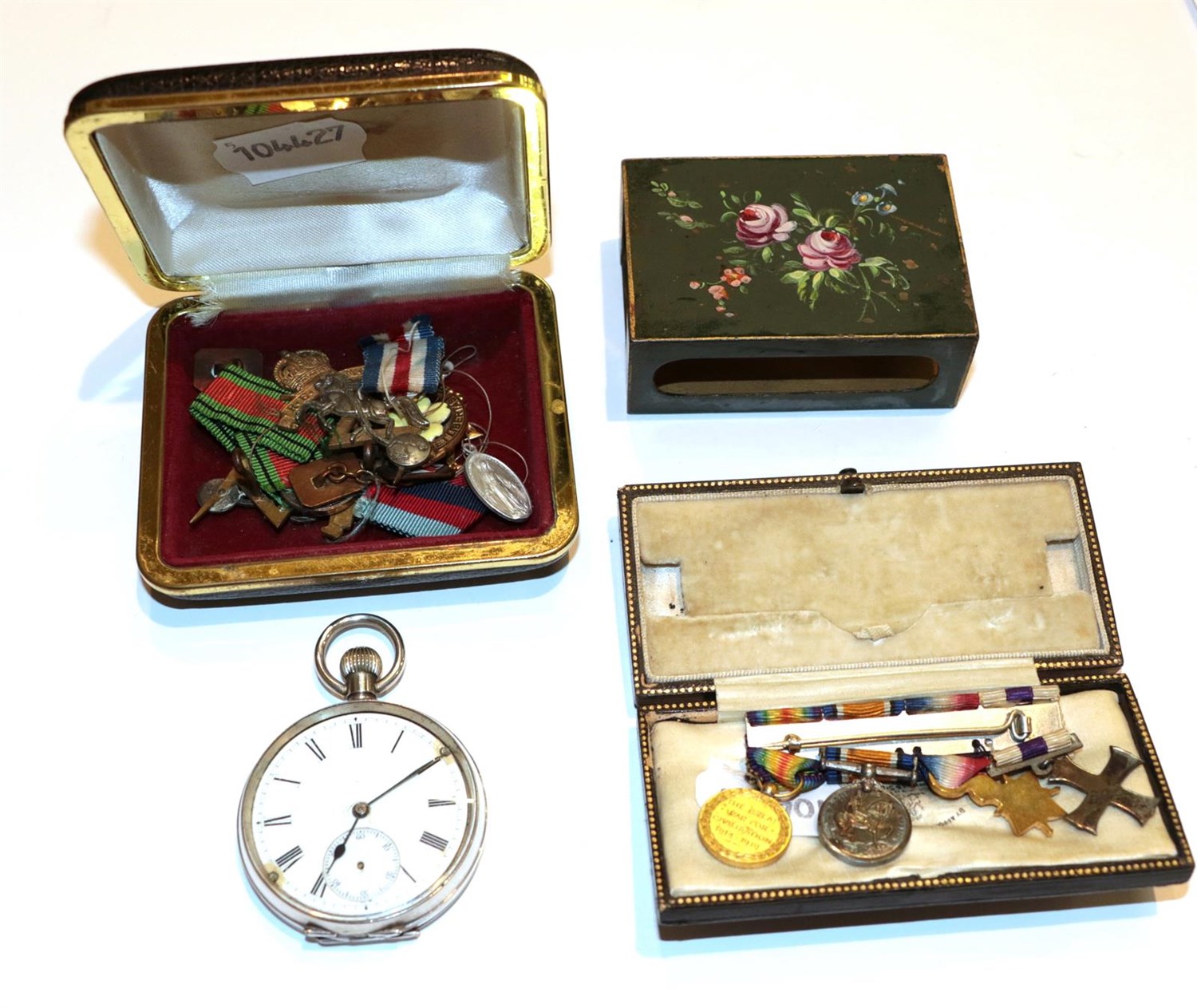 Lot 81 - Various miniature medals, cap badges, a silver pocket watch, match holder etc (qty)