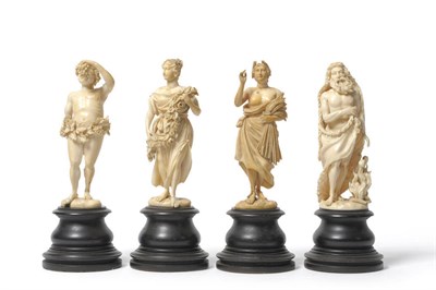 Lot 1103 - A Set of Four Dieppe Carved Elephant Ivory Figures Allegorical of the Seasons, circa 1880, each...