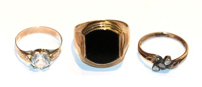 Lot 84 - An onyx signet ring, stamped '333', finger size U1/2; a colourless paste ring, unmarked, finger...