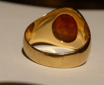 Lot 100 - A cornelian intaglio ring, unmarked, finger size V