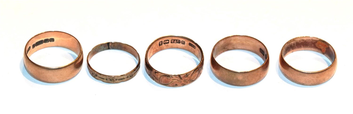Lot 128 - Four 9 carat gold band rings, various finger sizes; and an unmarked band ring