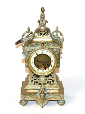 Lot 157 - A gilt metal striking mantel clock