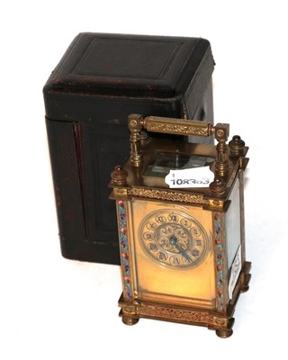 Lot 183 - A French brass and champleve enamel carriage timepiece circa 1900 with fitted travelling case