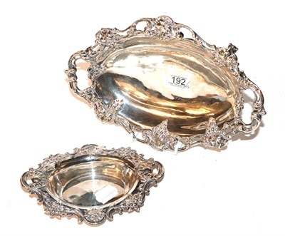 Lot 192 - A silver fruit dish, Birmingham marks, on four feet; with another dish (2)