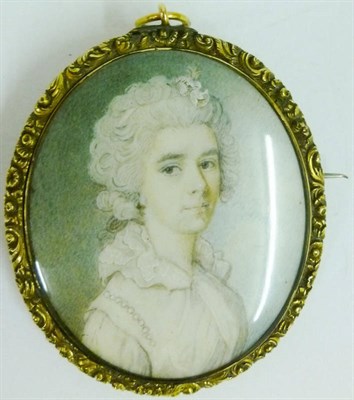 Lot 1116 - Follower of Richard Cosway: Portrait Miniature of a Pretty Young Woman, her grey powdered hair...