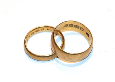 Lot 234 - Two 22 carat gold band rings, finger sizes I and K