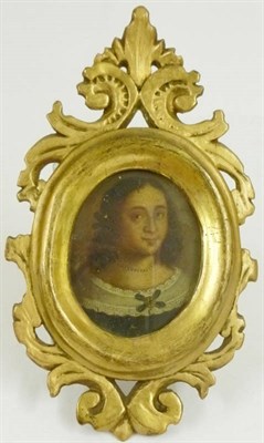 Lot 1118 - Continental School, 17th/18th century: A Miniature Bust Portrait of a Young Woman, with long...