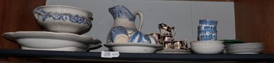 Lot 256 - A 19th century blue and white meat plate with drainer; blue and white pedestal twin-handled bowl; a