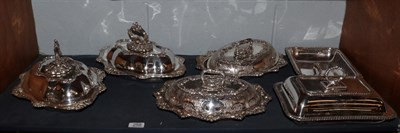 Lot 258 - Five various silver plated entree dishes with covers and handles, together with one base